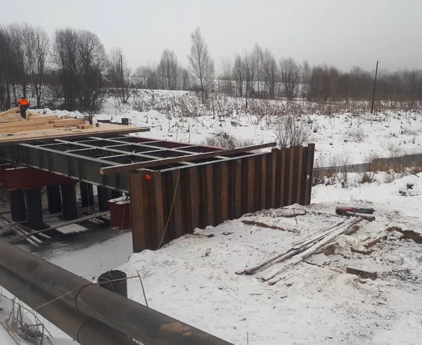 Устройство
временных мостов