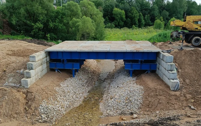 Устройство
временных мостов